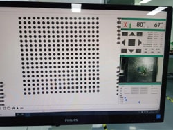 X-ray inspection screen showing a grid of BGA solder balls