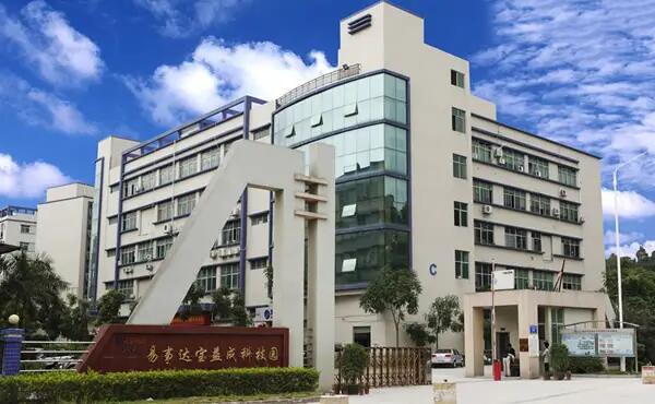 Multi-storey industrial park building with an entrance sign, shown on Tuofa's About page