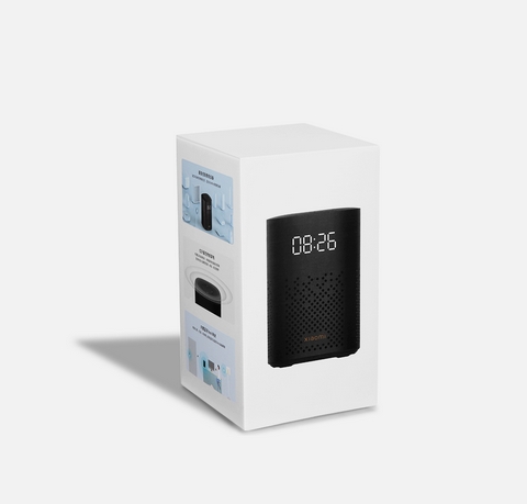 White retail box for a smart speaker clock, shown with the device